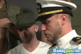 Bearded mature tastes cum after deepthroating young soldiers
